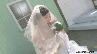 Asian bride Emi Koizumi gives a good blowjob after wedding