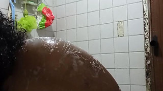 Pregnant Indian aunt shows you how she bathes and wiggles her buttocks for you