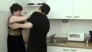 Hot mom and son in the kitchen