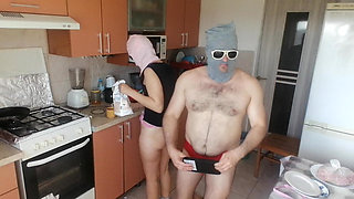Couple Having Fun in the Kitchen. Sexy Wife Doing Chores in the House Naked