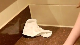 Student Taking A Piss on the Toilet