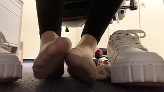 Showing my socks and feet while working