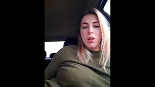 Young blonde in the car masturbates