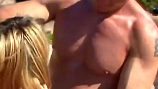 Small tits blonde loves anal group sex at the beach