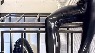 Anal Stretching a Caged Gimp