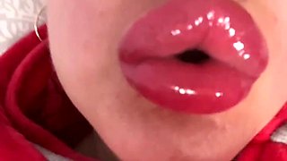 Captivated by the of Big Lips and Glossy Kisses