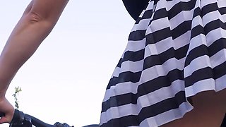 Flashing Ass While Riding a Bicycle Under Skirt