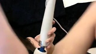 Cam Slut Squirts Cum Using Hitatchi With a Tampon in