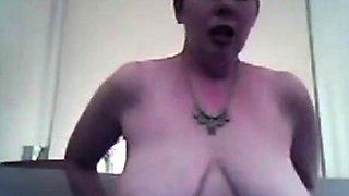 Busty mature brunette shows off her big natural saggy tits o