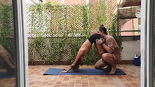 Balcony Bliss: She Stretches, He Can’t Resist