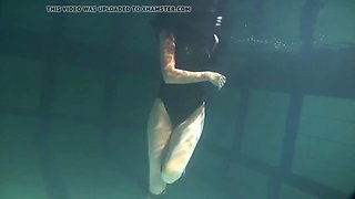 polcharova stipping and enjoying underwater swimming