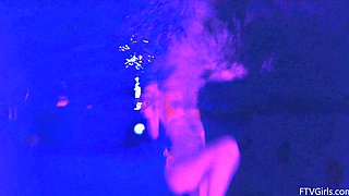 Natural tits brunette Lily swims in the pool and masturbates.