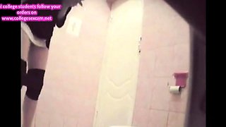 Girl changes tampon, toilet spy cam
