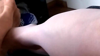 Sensual Play of Feet in Pantyhose