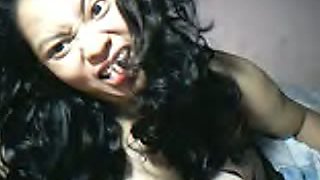 Gorgeous Filipina girl flashing her titties on webcam