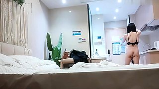 Cute amateur asian web cam girl playing with her toy
