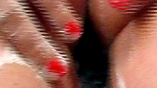 Bea Summer bathing in red