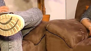 Couple does love making on the couch