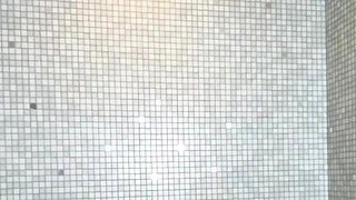 Hot babe with perfect big boobs taking shower