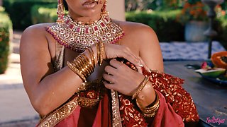 In the moonlit waters' embrace, Jasmine Sherni awakens sensual passions with graceful allure.