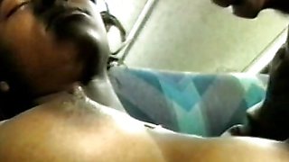 Black stud gets his huge cock sucked by ebony slut on the back seat of a bus
