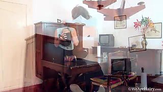 Tatiana strips and then masturbates with wooden peg - WeAreHairy