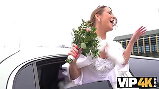 VIP4K. Sexy bride in white dress moans loudly being fucked in the wedding limo