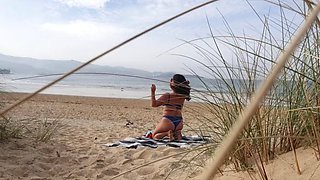 I filmed a curvy girl changing clothes and doing exercises on the beach.