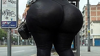 "Masked BBW Changes from Black Leggings to Tiny Thong at Public Bus Stop"