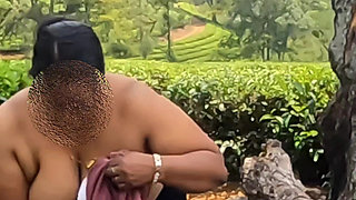Chubby Nudist, topless outdoor in the tea plantation, exposing boobs as ass