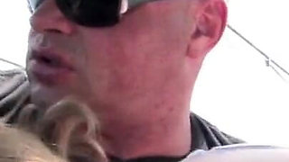 Blonde gets sprayed in outdoor action