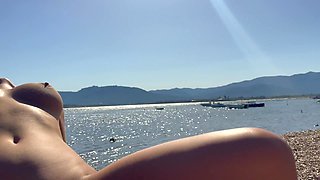 SHE CLIMBED INTO HIS LAP RIGHT ON THE BEACH WITH A SUNLIGHT ON HER SKIN