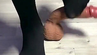 Sexy Dominatrix in Nylon Pantyhose Is Trampling Your Cock