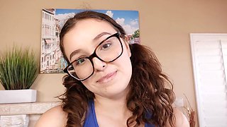 Brunette Leana Lovings seduces with her shaved pussy and glassed gaze