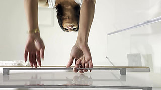 Miniskirt Lover Raver Girl Reveals Her Piercing on Her Pussy in the Bathroom by Lifting Her Short Skirt