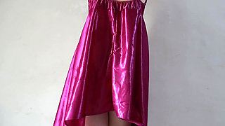 A GIRL WHO WEARS A SEXY SATIN DRESS IN THE LATEST INDO