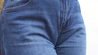 MILF Teasing Her Big Cameltoe in Blue Jeans Outdoors