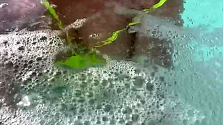 Artemisia Love Swimming in the Pool Flashing Her Big Juicy Boobs and Smoking a Cigarette