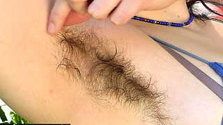Blue Tipped Hair Girl Shows Tattoos and Armpits