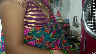 Stepmom in the kitchen shows her big nipples and gives her stepson a Hindi audio